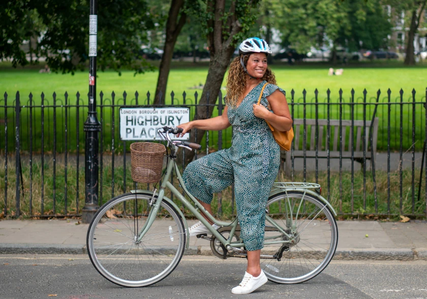 Woman cycling - get into shape